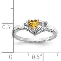Prsten od bijelog zlata u obliku srca s citrinom i dijamantom.