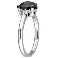 Zaručnički prsten od bijelog zlata od 14 karata s crno-bijelim dijamantom.